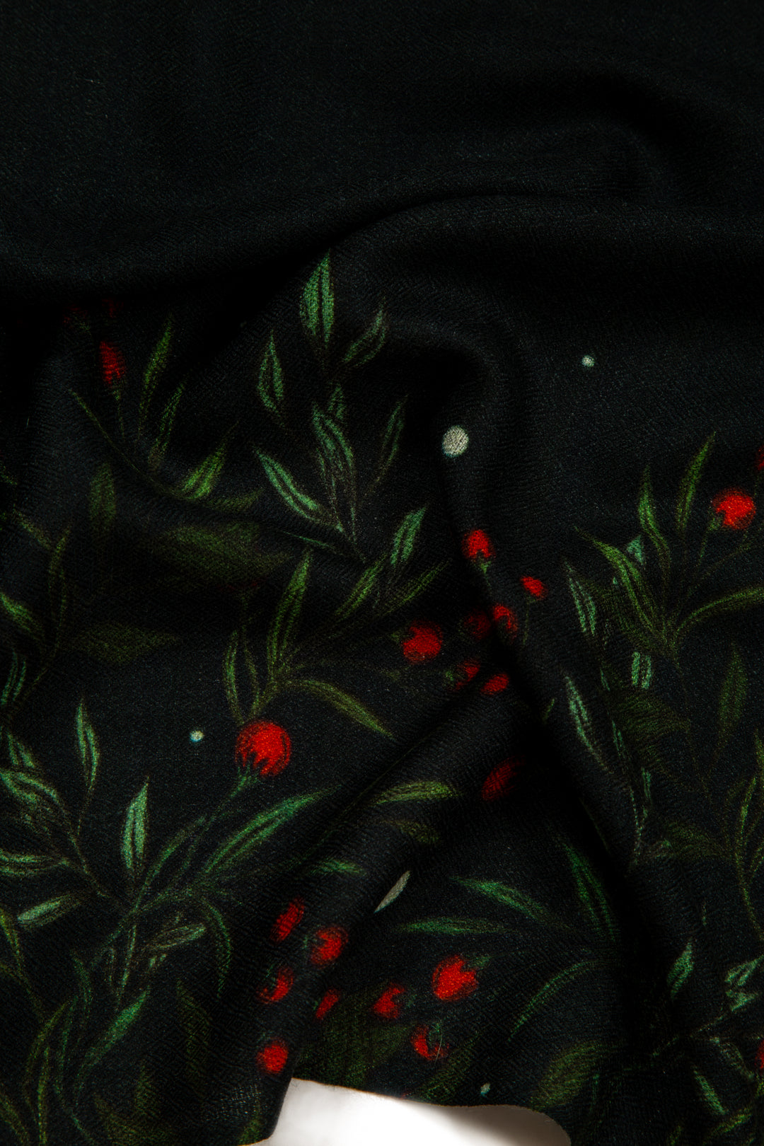 Elegant Merino wool and silk shawl draped over shoulders,perfect for women's evening wear