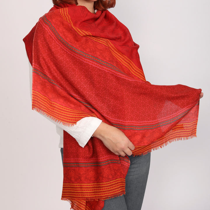 Elegant Merino wool and silk shawl draped over shoulders,perfect for women's evening wear