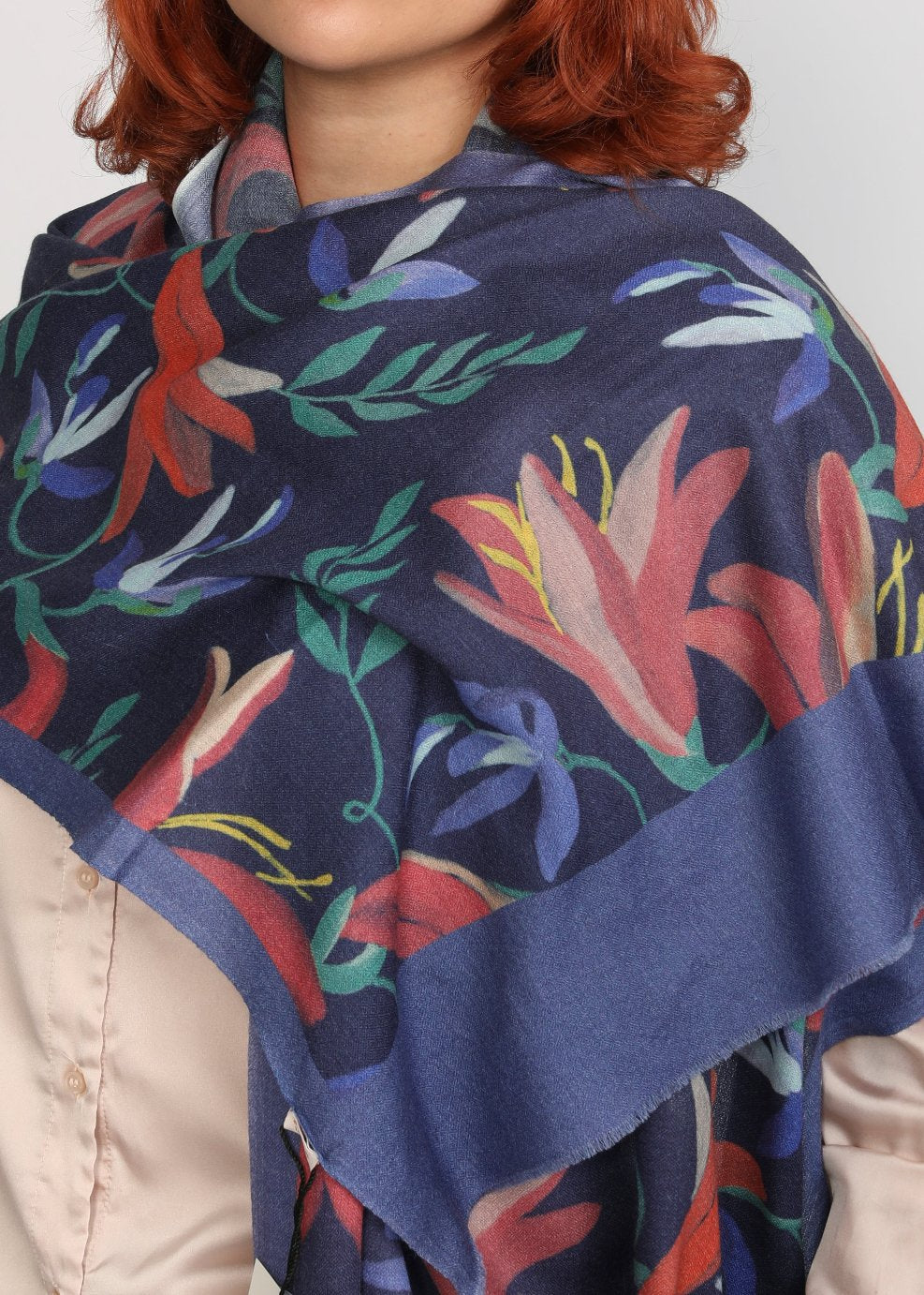 Elegant Merino wool and silk shawl draped over shoulders,perfect for women's evening wear