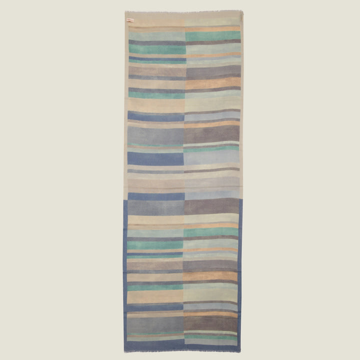 Elegant Merino wool and silk shawl draped over shoulders,perfect for women's evening wear