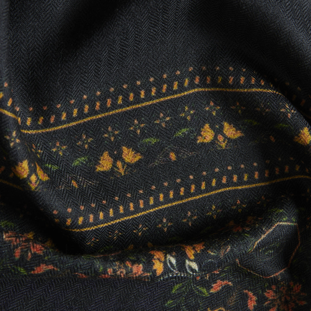 Elegant Merino wool and silk shawl draped over shoulders,perfect for women's evening wear