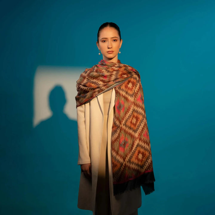 Elegant Merino wool and silk shawl draped over shoulders,perfect for women's evening wear