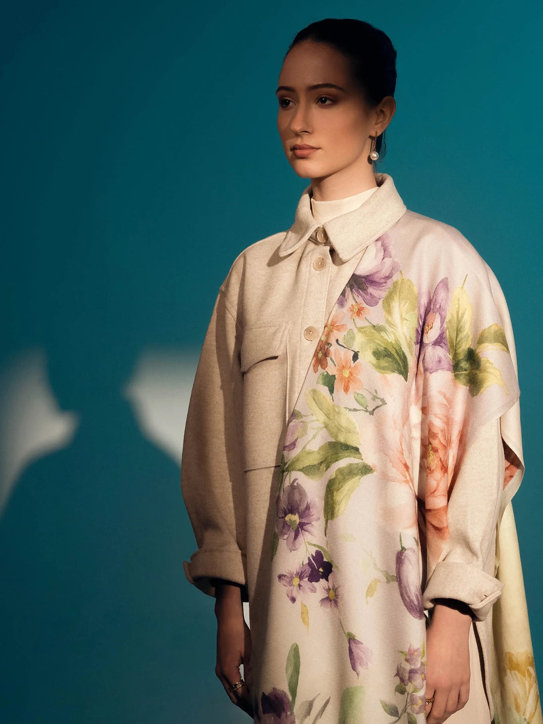 Elegant Merino wool and silk shawl draped over shoulders,perfect for women's evening wear