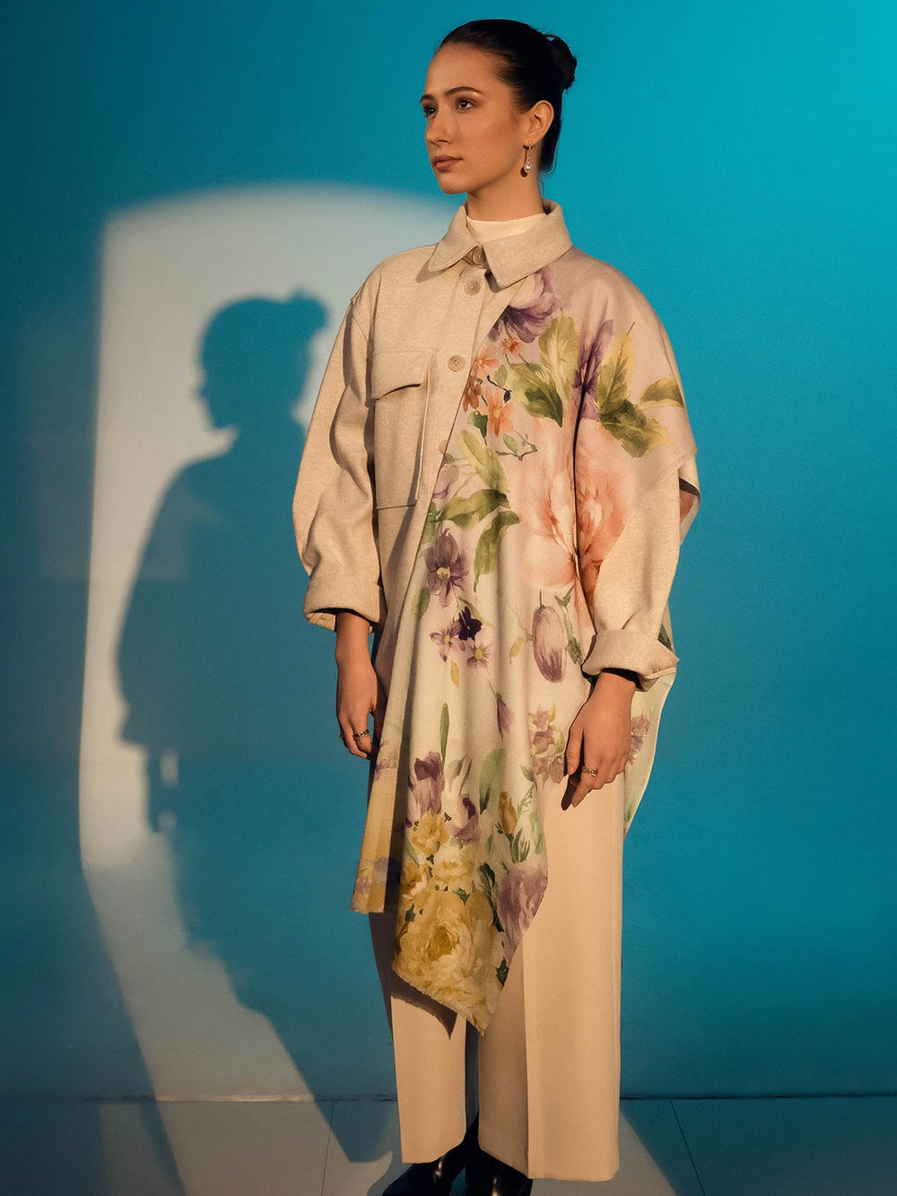 Elegant Merino wool and silk shawl draped over shoulders,perfect for women's evening wear