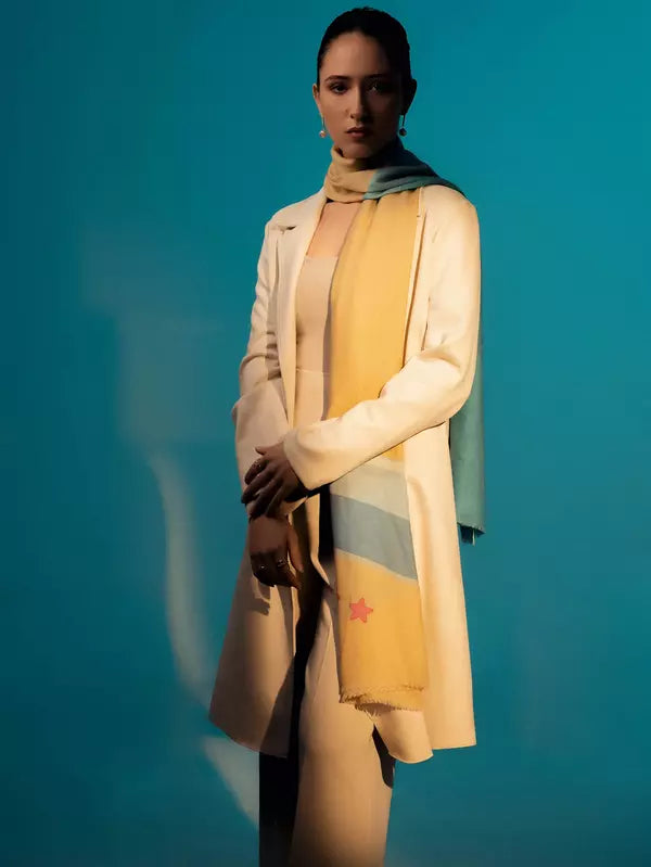 Elegant Merino wool and silk shawl draped over shoulders,perfect for women's evening wear