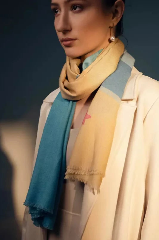 Elegant Merino wool and silk shawl draped over shoulders,perfect for women's evening wear